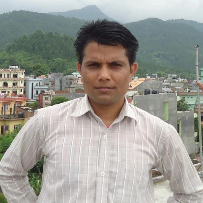 Mr. Dhan Bahadur Pun (Thapa)
